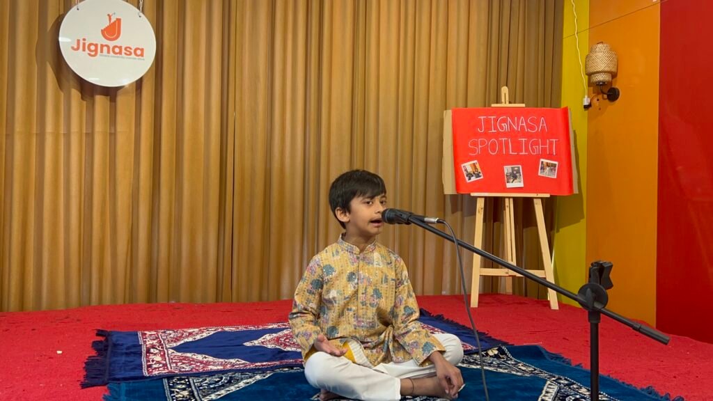Children performing on stage.